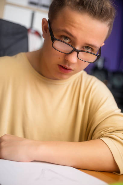 istock Young artist drawing at home 897671722
