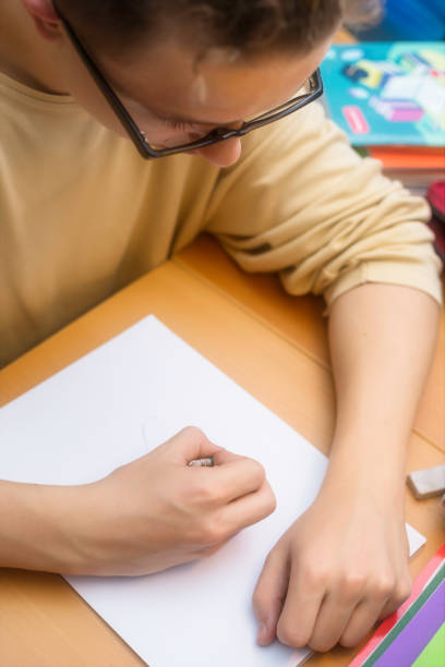 istock Young artist drawing at home 897671752
