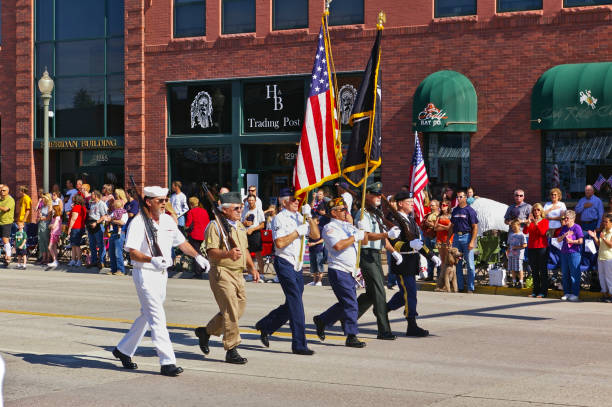 Cody, Wyoming, USA - July 4th, 2009 - Veterans of the different branches of the armed forces marching with the Independence Day Parade