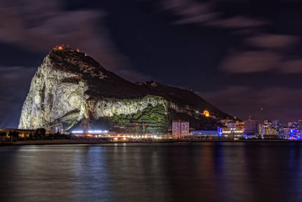 Night view on Gibraltar rock from Spanish town La Linea de la Concepcion. Night view on Gibraltar rock from Spanish town La Linea de la Concepcion. gibraltar photos stock pictures, royalty-free photos & images
