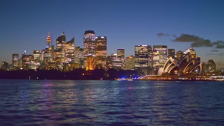 Real time video travelling on ferry in Sydney at dusk.