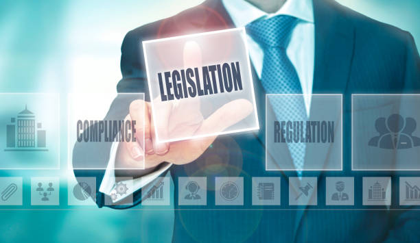 Legislation Concept A businessman pressing a Legislation button on a transparent screen. research ethics stock pictures, royalty-free photos & images