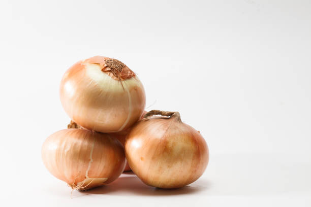 istock Group of onions isolated 897714418