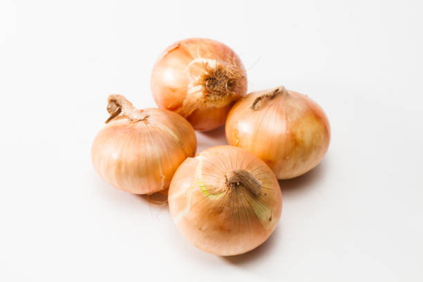 istock Group of onions isolated 897714438