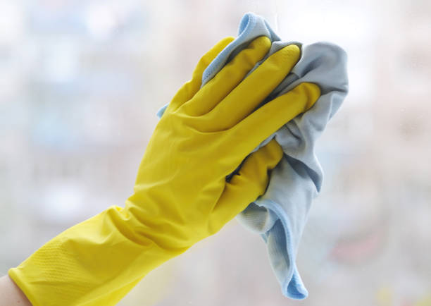 istock washing windows. cleaning. hand on the window background 897716908