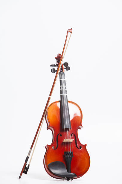 istock Stand of violin with bow isolated on white 897717062