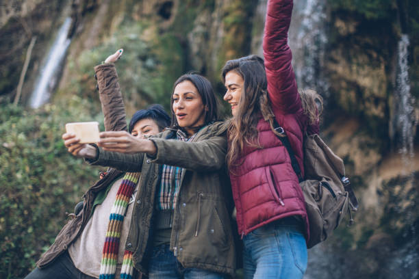 istock Girfriends selfie in nature 897717304