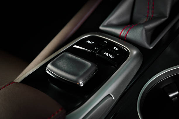 istock Media and navigation control joystick in a modern car 897729420