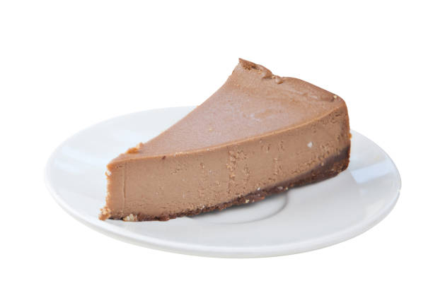 istock chocolate cheesecake on white plate on  wooden table 897738728