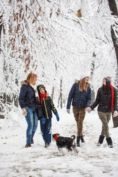 istock Family enjoying in snow 897748546