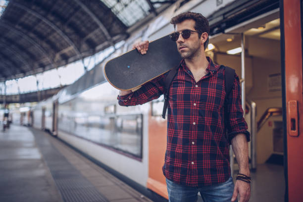 istock Skater man leaving city 897748706
