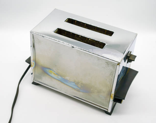 istock Classic vintage chrome toaster isolated on white background 897753106