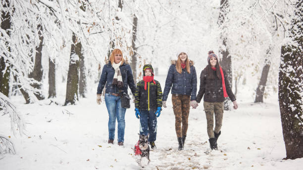 istock Family enjoying in snow 897762592