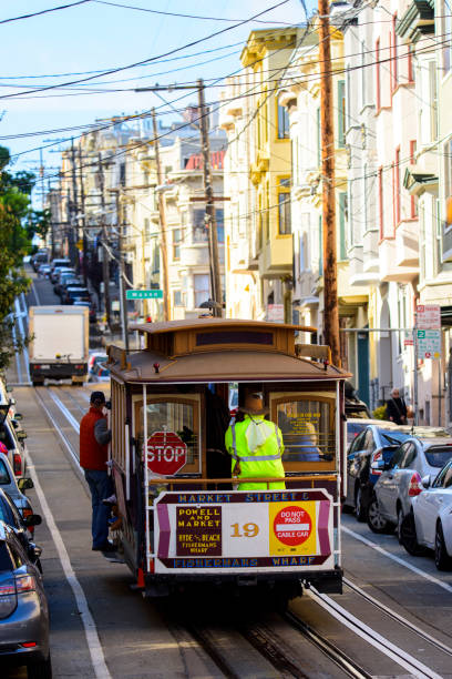 San Francisco, California,USA - November 27, 2017 : Street car of busy china town in San Francisco, California. People are riding famous street car in San Francisco. It is major tourist attraction in San Francisco.