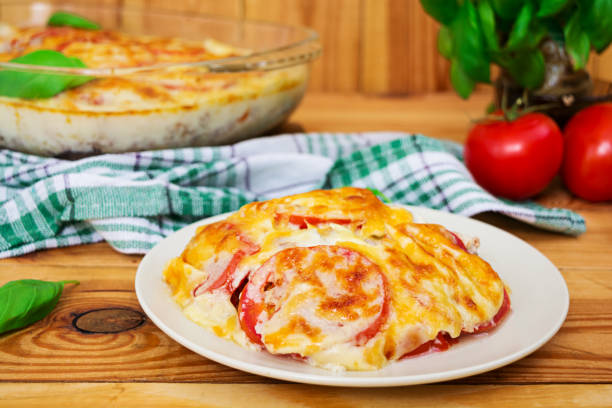 istock Eggplant casserole. Moussaka on wooden background 897784478