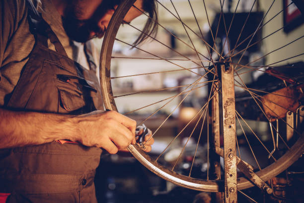istock Man working in repairshop 897791546