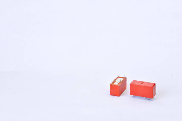 istock Orange color of electronics part with white background 897796634