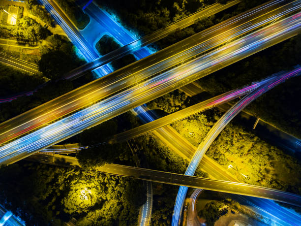istock Aerial highway junction at night time 897805960
