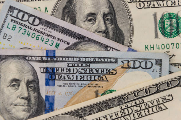 istock Background of one hundred dollar bills 897806018