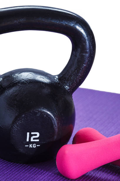 istock Kettlebell, dumbbells and yoga mat 897811930