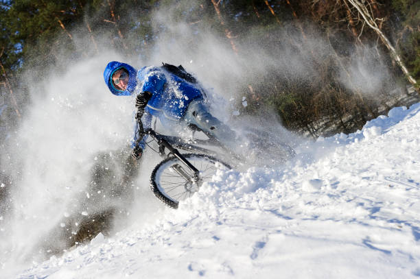 istock Extreme winter cyclist in snow 897811944
