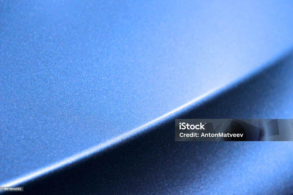 Blue car bodywork Fragment of blue steel car bodywork, vehicle silver paint coating texture, selective focus, abstract Car Stock Photo