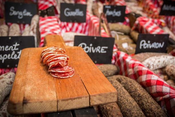istock Sausage on board in shop 897816756