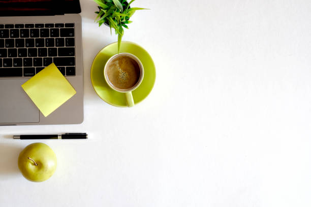 istock Office: Desktop with Laptop, coffee with supplies. 897837550