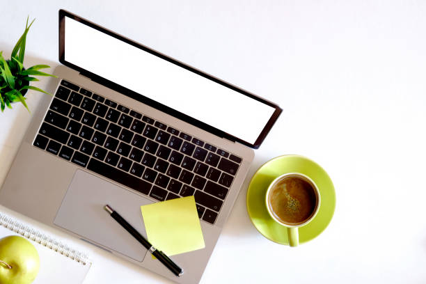 istock Office: Desktop with Laptop, coffee with supplies. 897837562