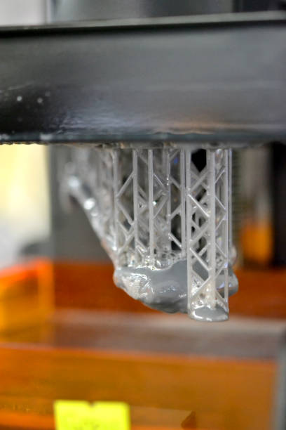 istock Stereolithography DPL 3d printer create small detail and liquid drips 897839770