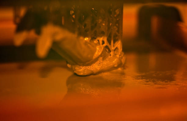 istock Stereolithography DPL 3d printer create small detail and liquid drips 897839788