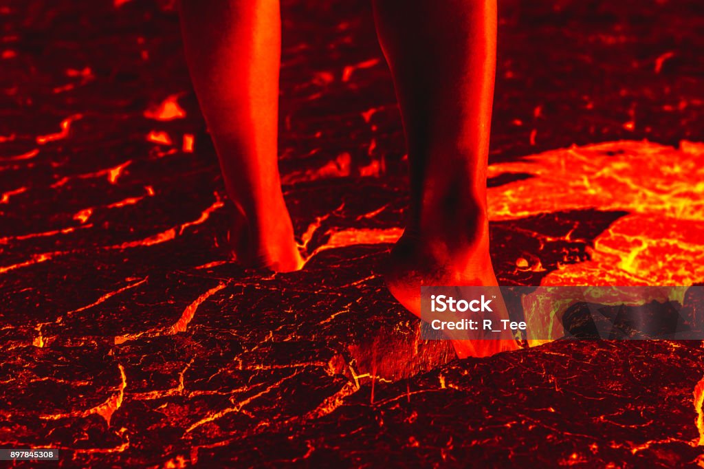 Foot on the lava floor because of global warming. Foot Stock Photo