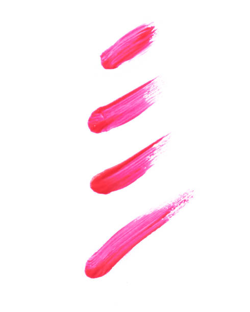 istock Pink color lip gloss paint on background 897850526