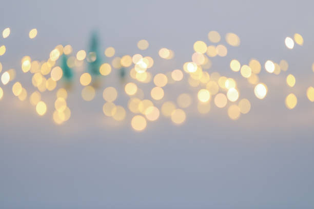 istock Christmas background with defocused festive light 897862860