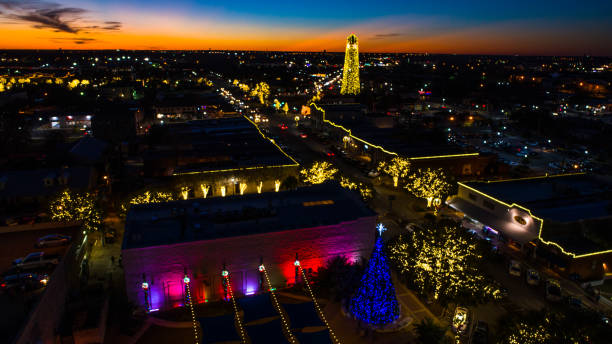 istock Round Rock , Texas Christmas display in downtown aerial drone view 897863150