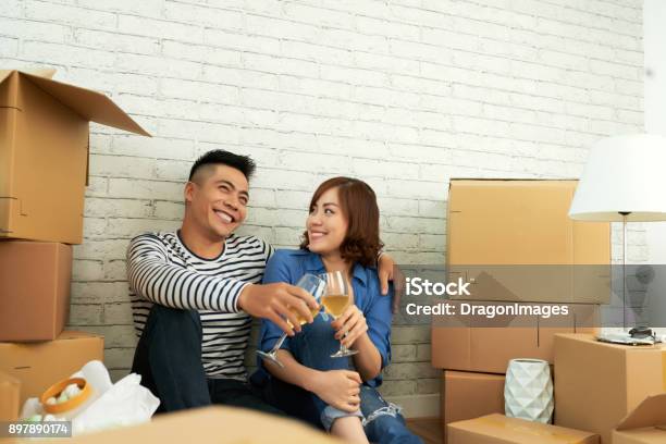 Dreaming Young Couple Stock Photo - Download Image Now - Adult, Alcohol - Drink, Apartment