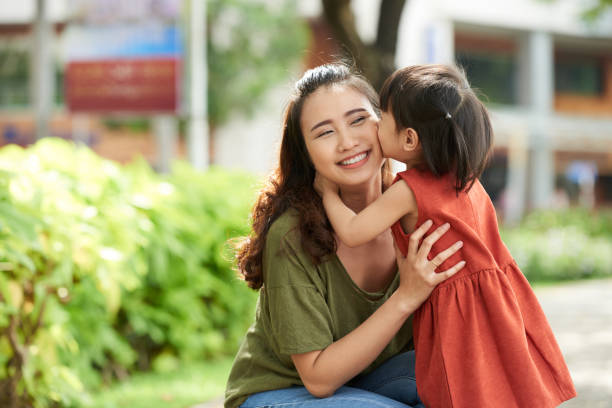 istock Kissing mother 897892878