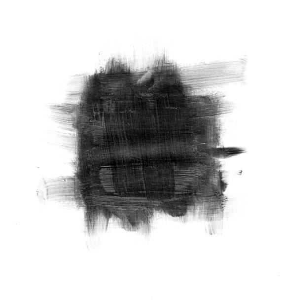 istock Black stain carelessly painted on white background with visible brush movement 897893084