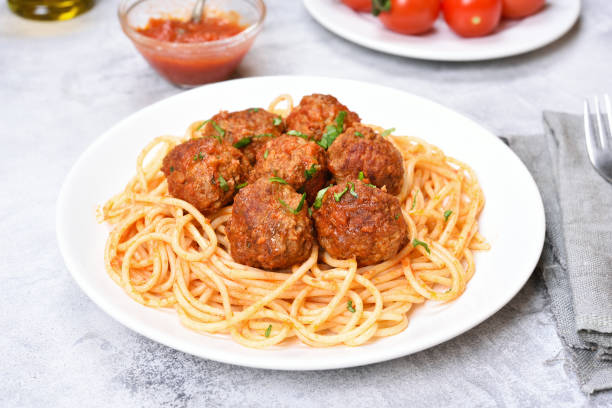 istock Spaghetti with tomato sauce and meatballs 897893154