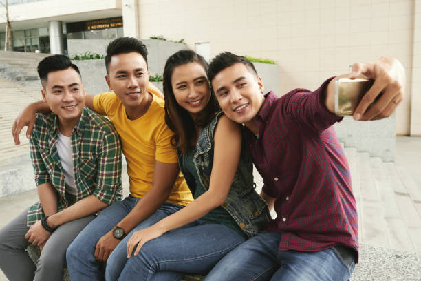 istock Selfie with friends 897895710