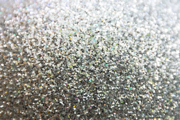 istock Abstract blurred bokeh of siver grey twinkled glitter use for christmas background. 897906178