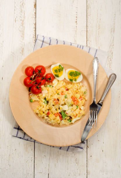 istock mixed vegetarian pasta salad with egg and vegetables 897908936