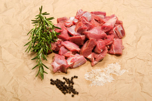 istock raw deer goulash with rosemary, pepper corn and kosher salt 897909038