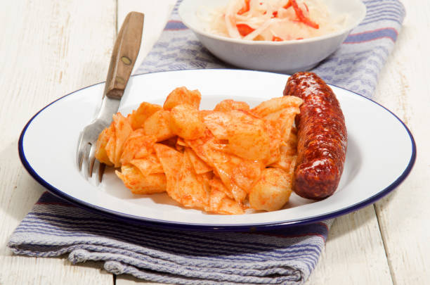 pasta and potato with paprika powder, kolbasz and sour vegetable