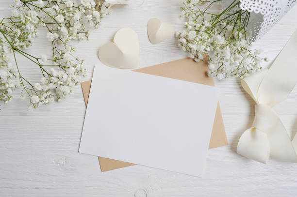 istock mockup Letter with a calligraphic pen greeting card for St. Valentine's Day in rustic style with place for your text, Flat lay, top view photo mock up 897928434