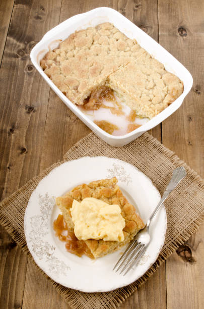 istock freshly baked rhubarb crumble with custard 897933096