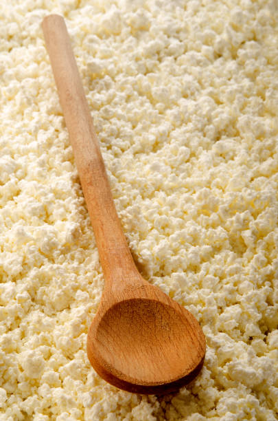 istock home made cottage cheese with wooden spoon 897936642
