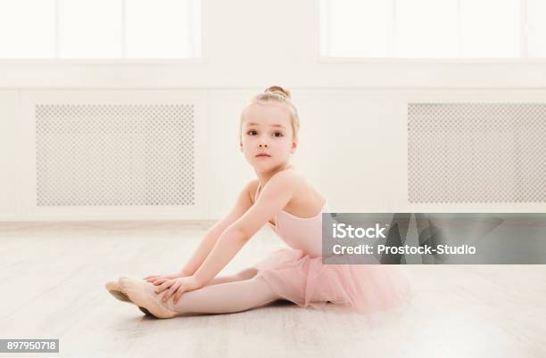 Portrait Of Little Ballerina On Floor Copy Space Stock Photo - Download Image Now - Ballet, Child, Small