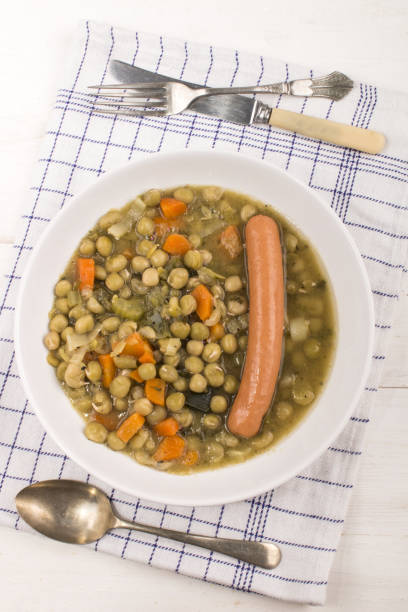 istock peas soup with carrots and sausage in a deep plate 897951342