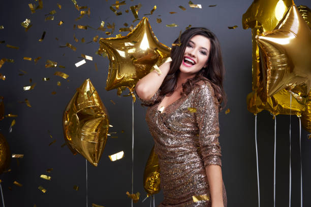 istock Pretty woman dancing and smiling 897969034